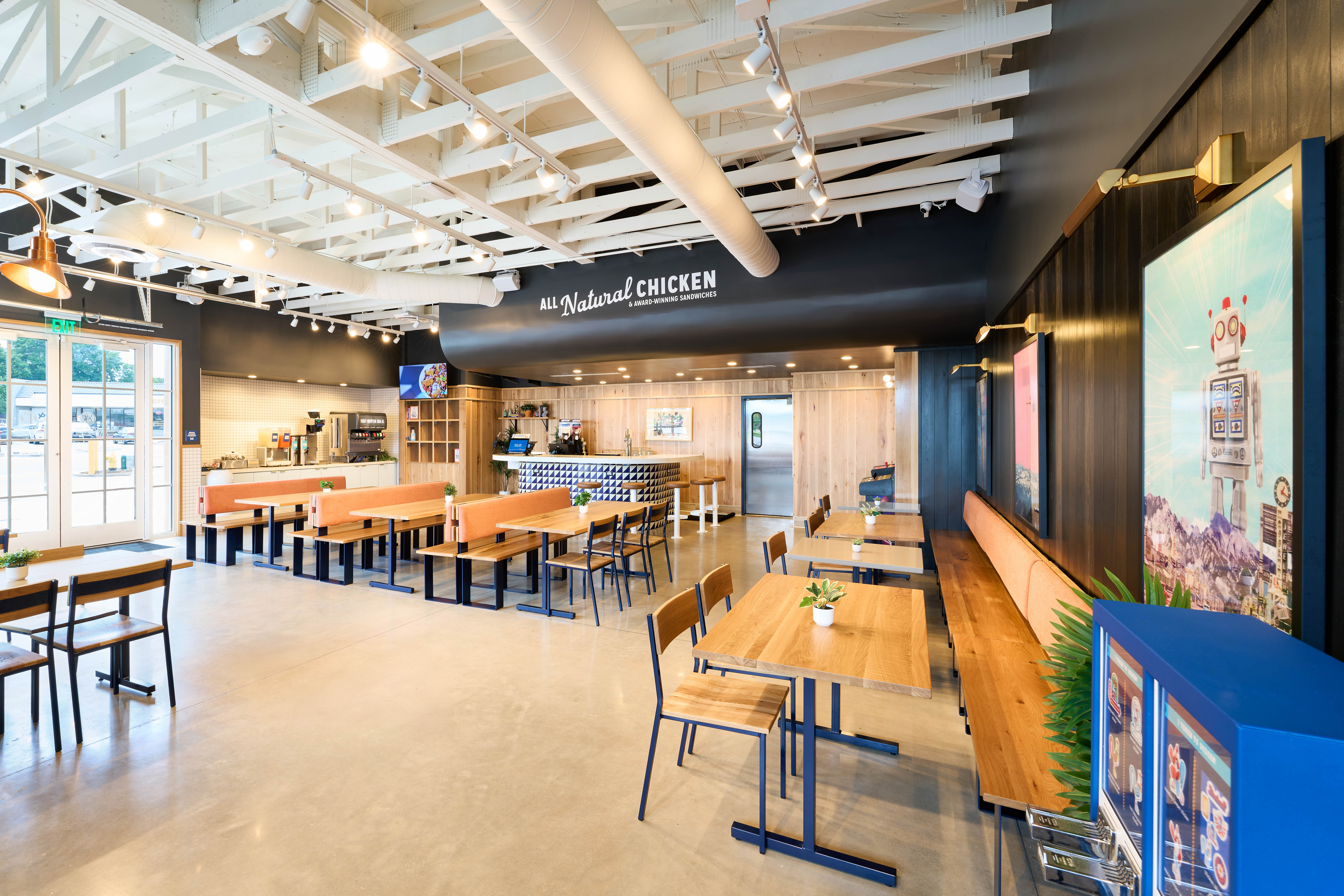 Interior of Birdcall Cherrywood Square, showing off the full dining room, ordering system, and drink station.