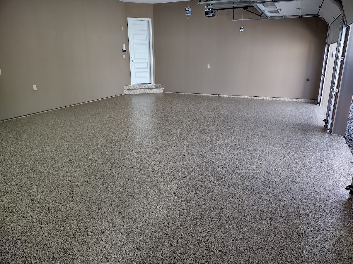 A beautiful Sedona epoxy flake garage floor to match the patio in Hershey!