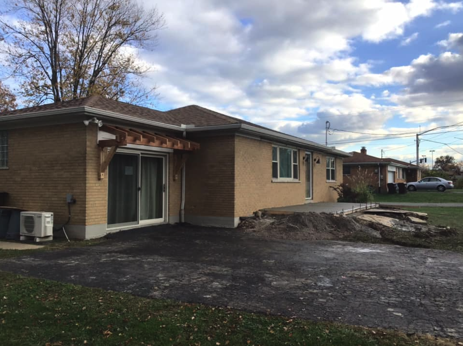 This home in Mason, Ohio originally had a car port on the left. But the owner wanted to build a home addition in that space. We had to add on to the roof, build the walls to match the house and finish the inside. We also poured a new concrete porch for the family. Does your home need more space? Call us today for a free consultation.