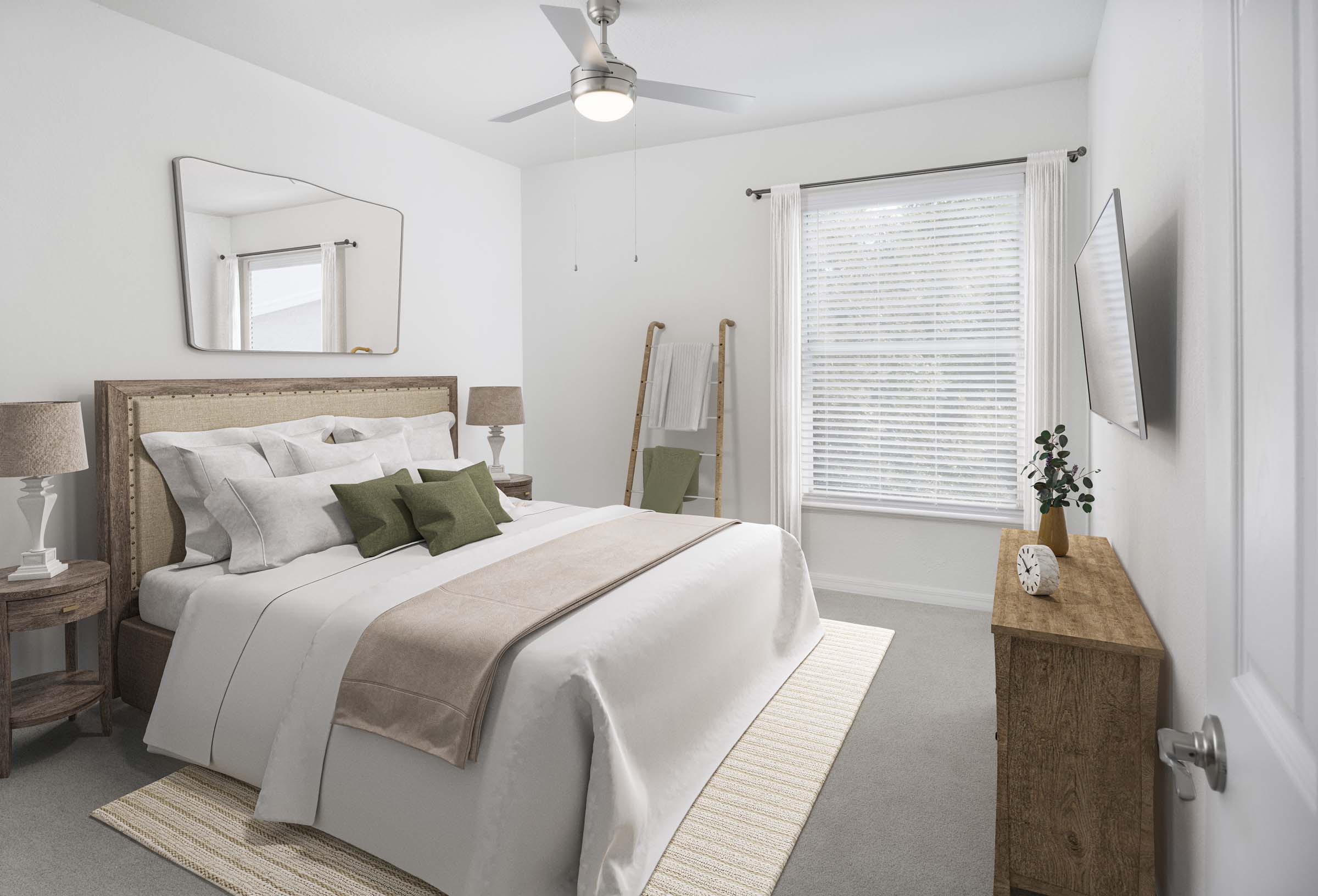 Bedroom with plush carpet and modern ceiling fan at Camden World Gateway apartments in Orlando, FL
