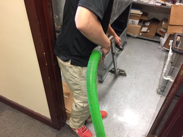 Our SERVPRO team working hard extracting water!