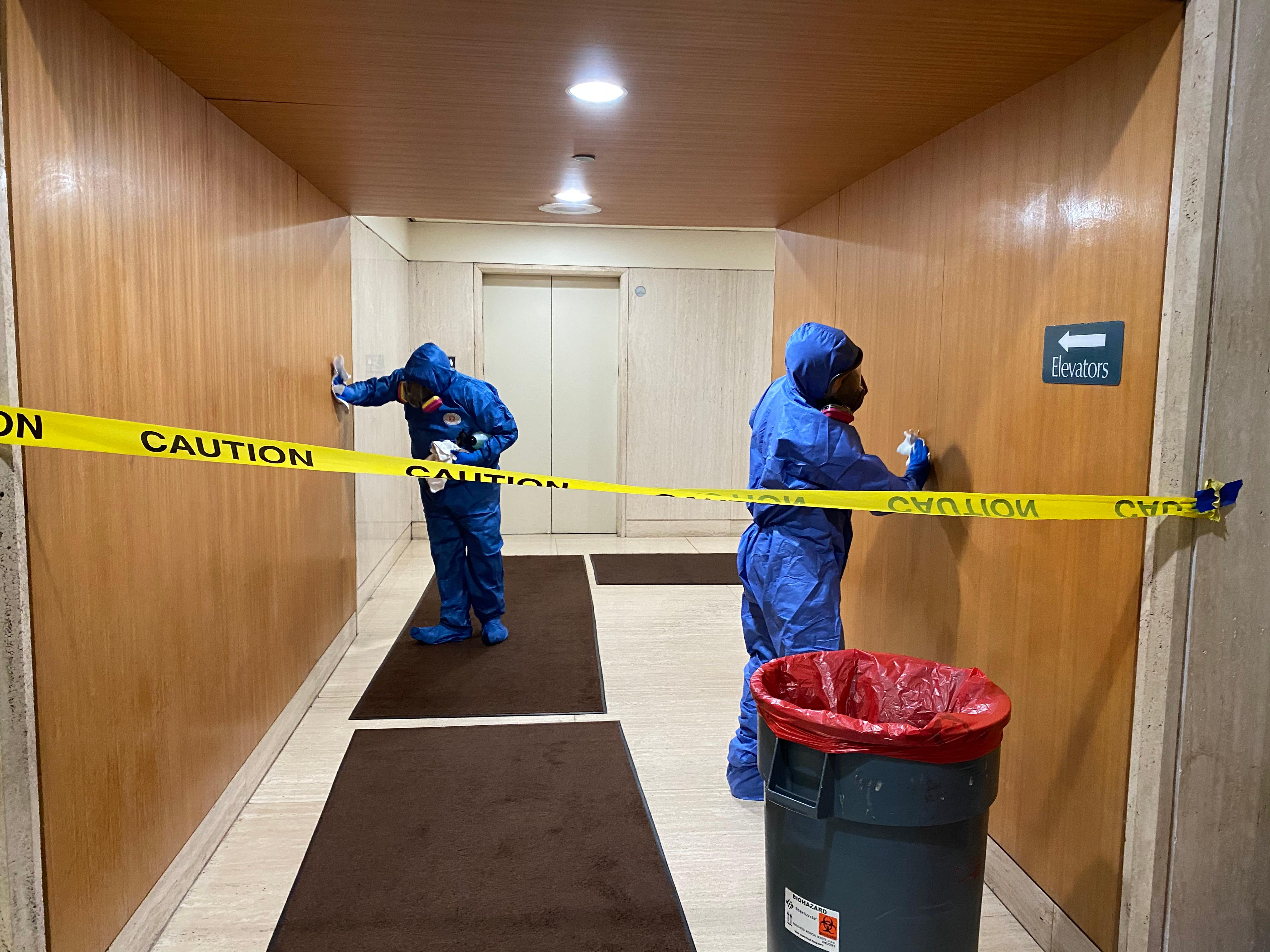 COVID-19 Cleanup disinfecting in lobby of commercial business complex
