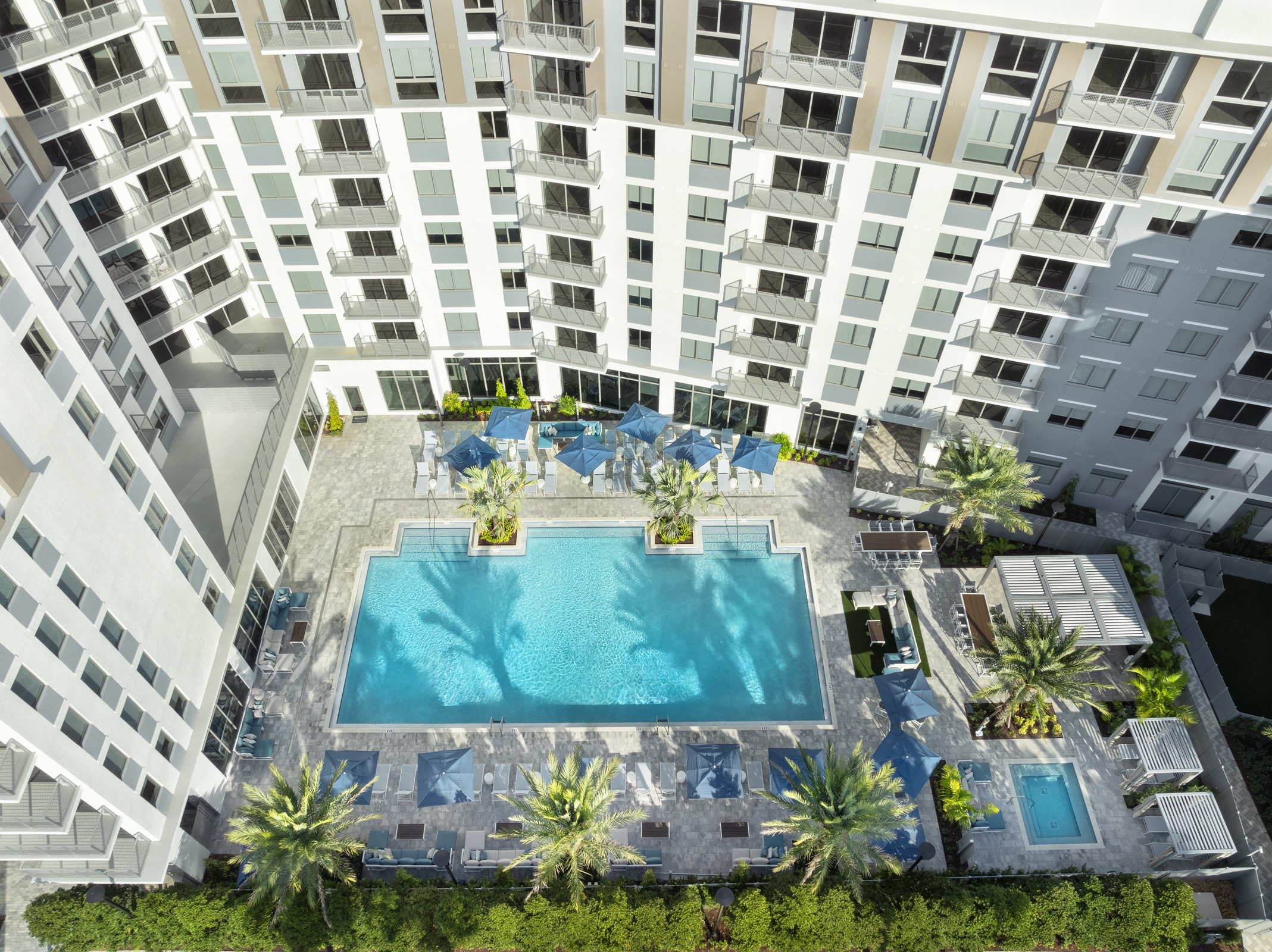 Resort-Inspired Pool Deck at The Marc Luxury Apartments in Palm Beach Gardens FL