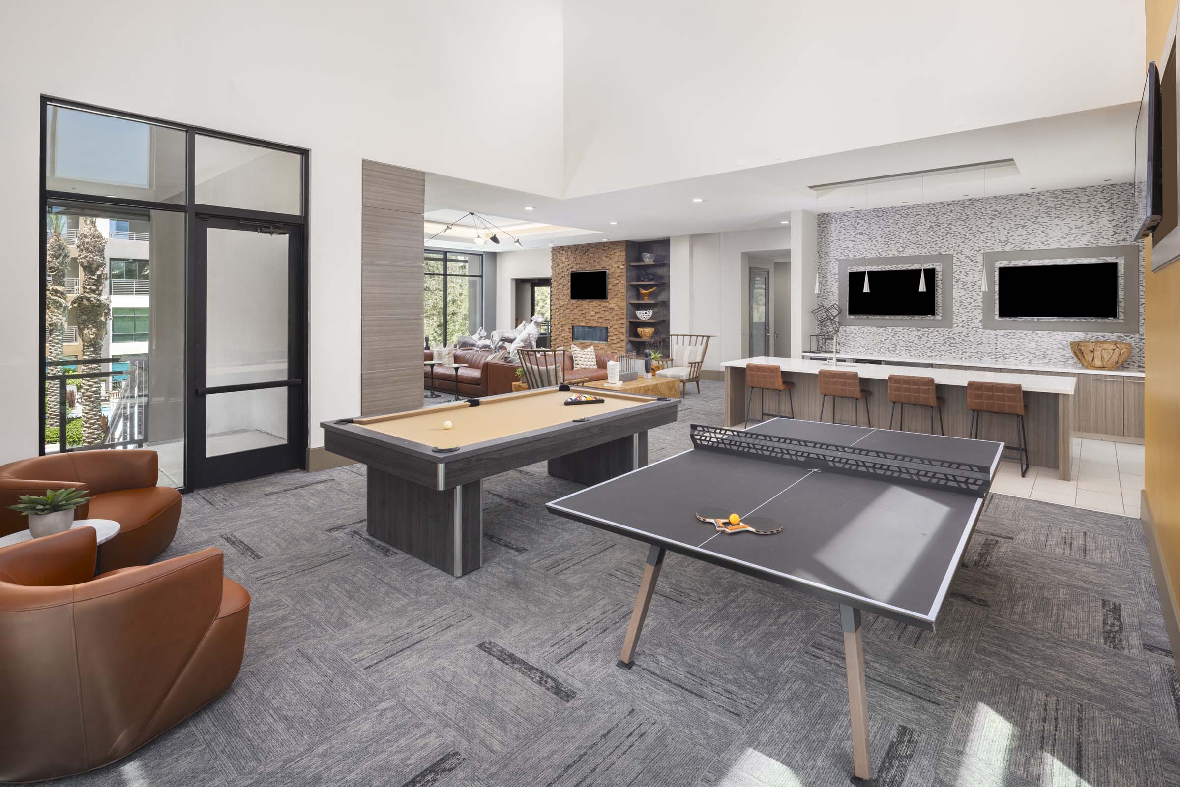 Second floor resident lounge with billiards and ping pong table at Camden Tempe apartments in Tempe, AZ