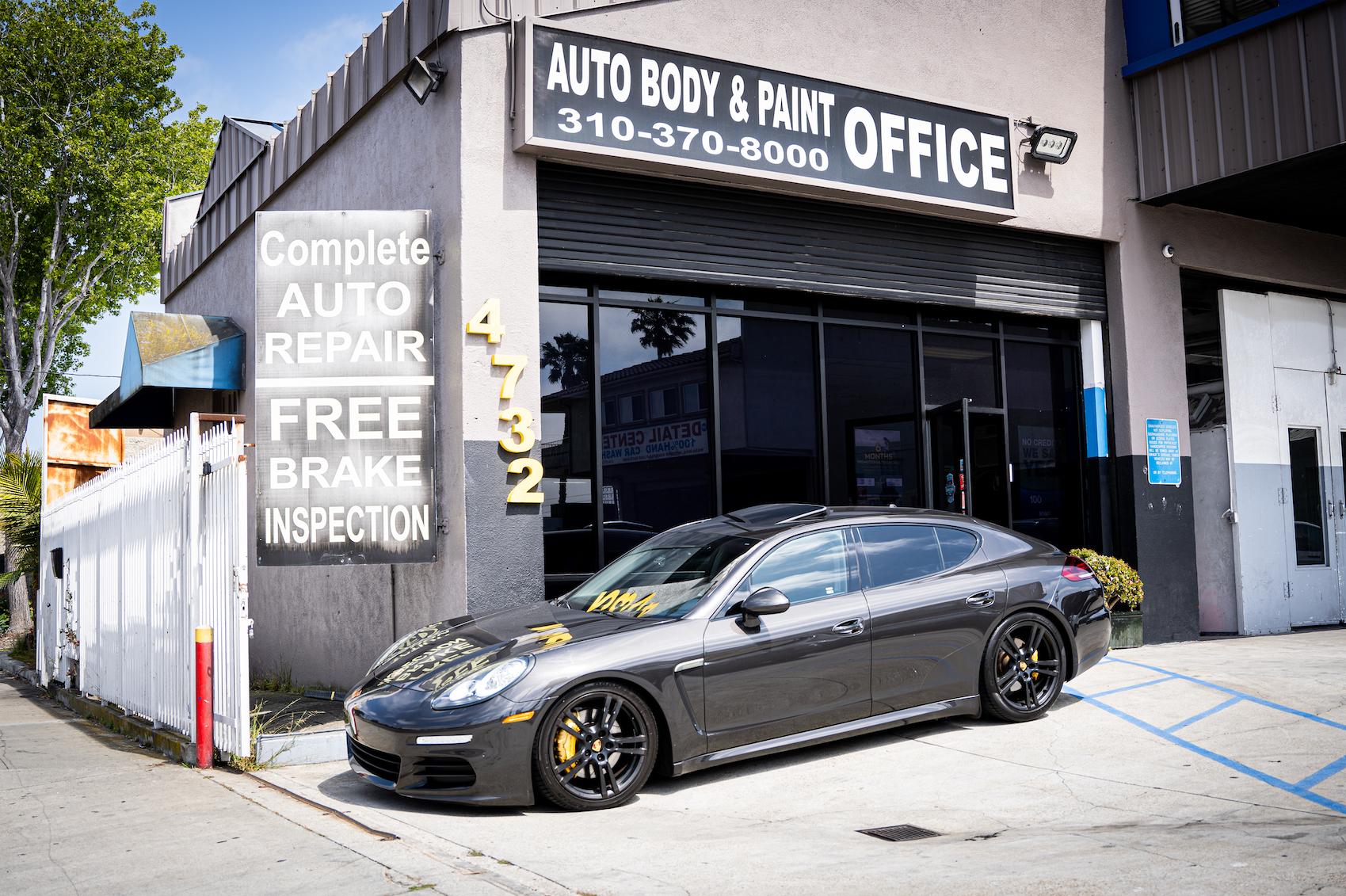 Detailed photo of Porsche waiting at auto body shop parking lot for collision repair