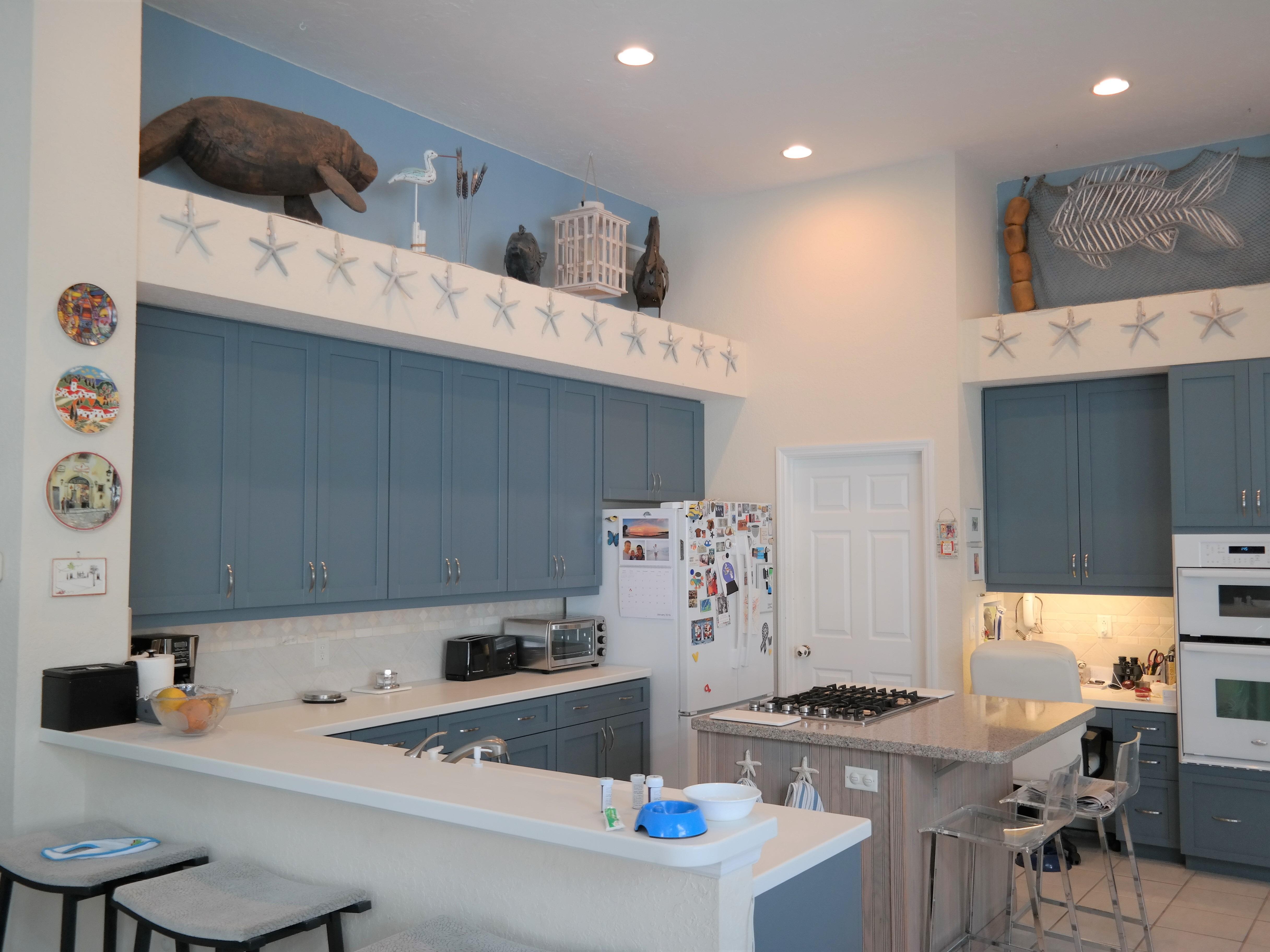 Re-A-Door Kitchen Cabinets Refacing Tampa Beautiful beach water blue kitchen cabinet doors and cabinet refacing in Tampa, Florida, perfect for a summer-style beach home.