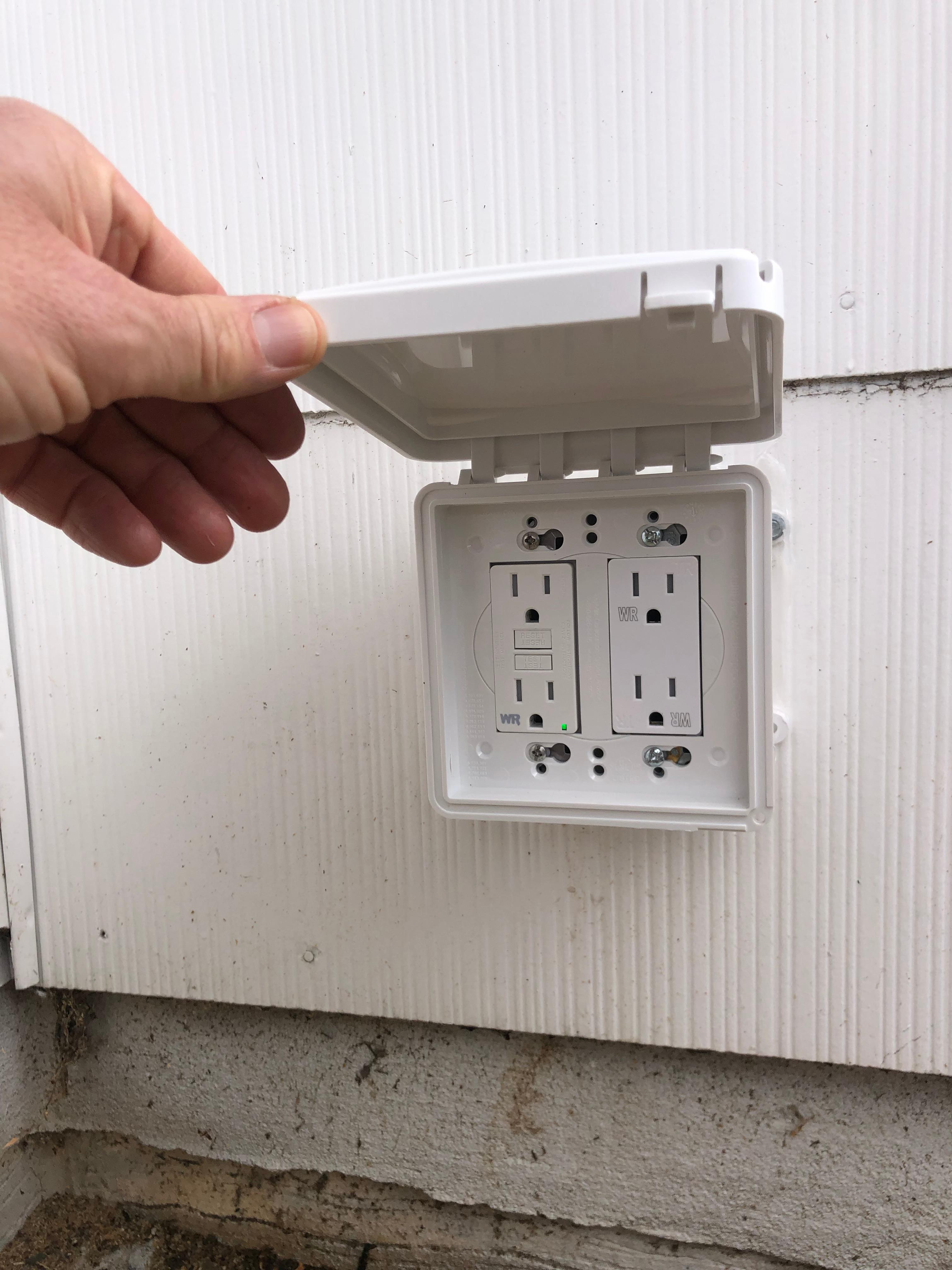 Installed an exterior rated WR (weather-resistant)  quad receptacle. Dedicated 20 amp line with GFCI (ground-fault circuit interruption) protection.