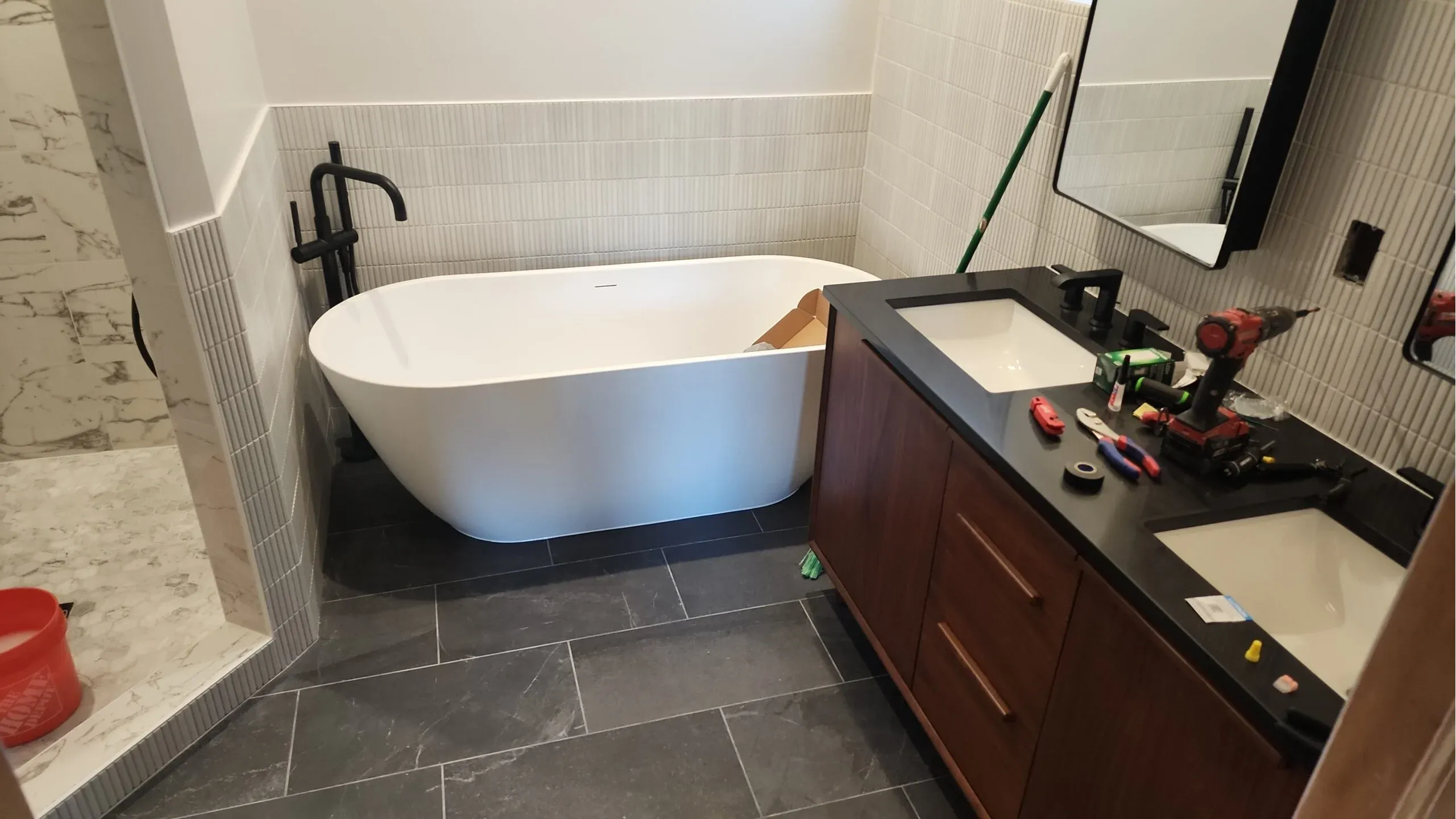 Check out this Bathroom Remodel in Lincoln Park, Chicago. New tub and bathroom vanity combo.