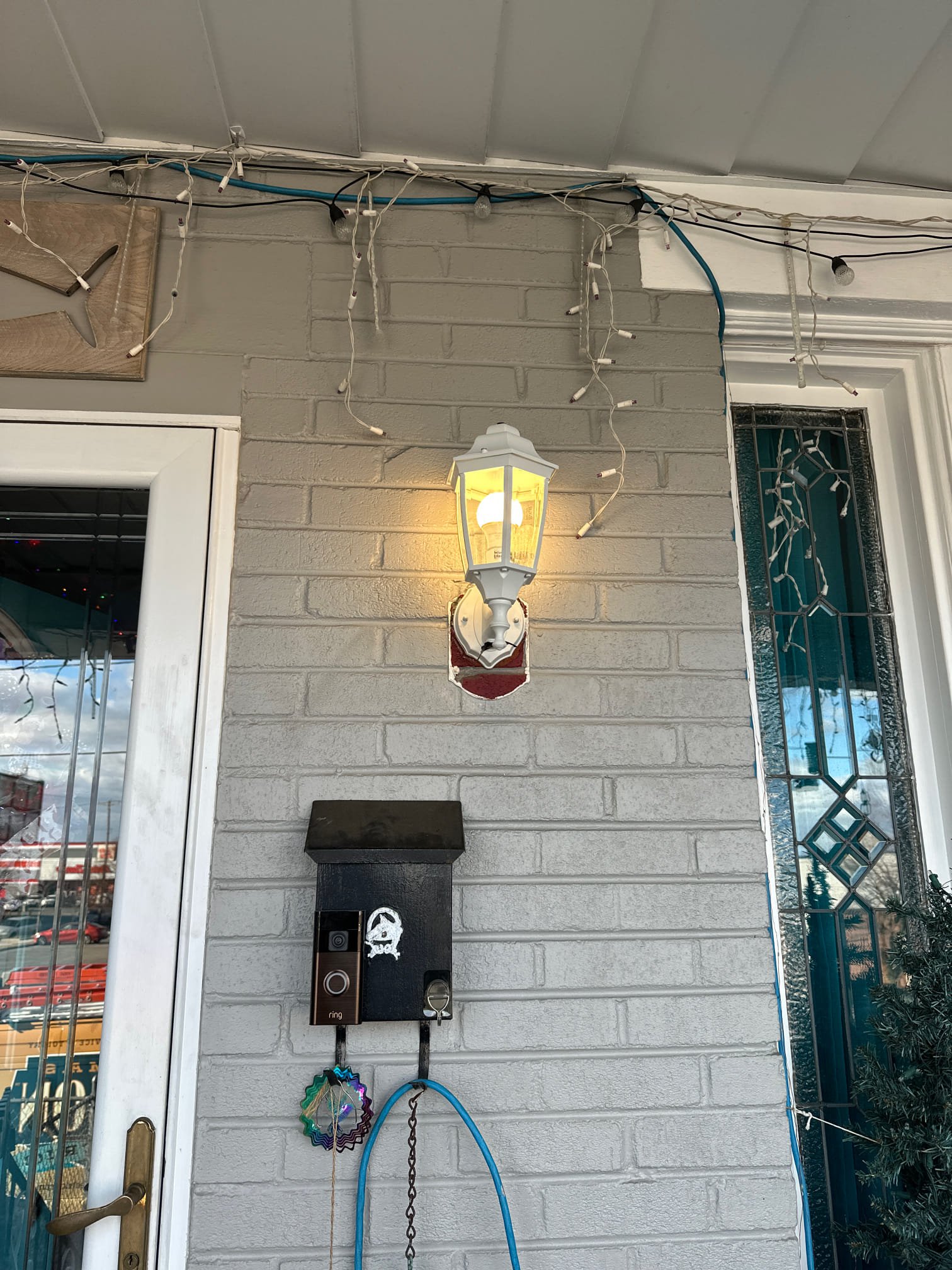 Thomas Edison Electric installed a front porch lantern and a Ring video doorbell at a Philadelphia, PA rowhome. The classic carriage-style light provides curb appeal while the Ring doorbell adds smart home security right at the front entrance.