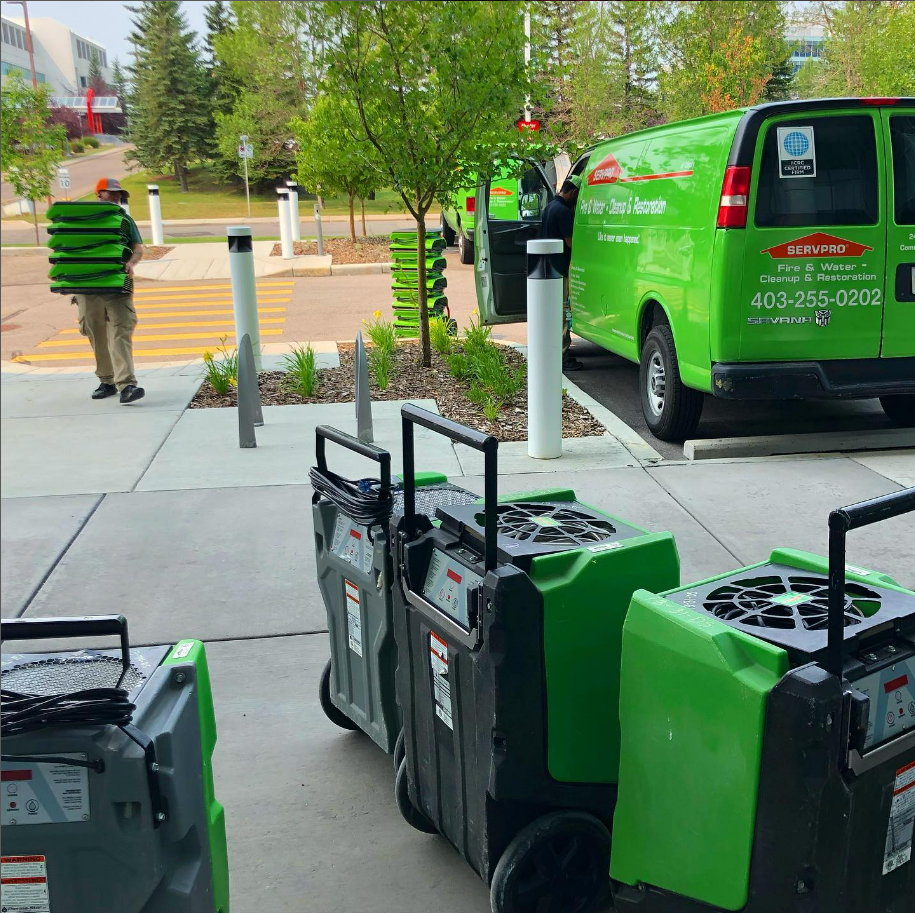 SERVPRO Crew Chief unloading equipment from their work van SERVPRO of Calgary Downtown, Skyview, South-Southeast Calgary (403)255-0202