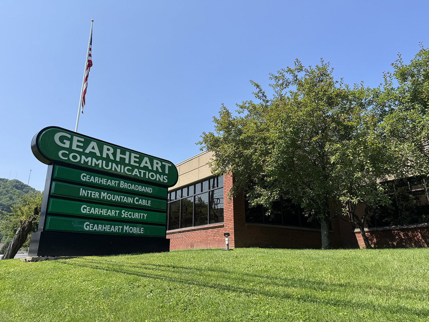 Gearheart Communications sign displayed in front of the company building, representing Gearheart&rsquo;s local commitment to fast, reliable broadband, WiFi, TV, phone, security, and mobile services.
