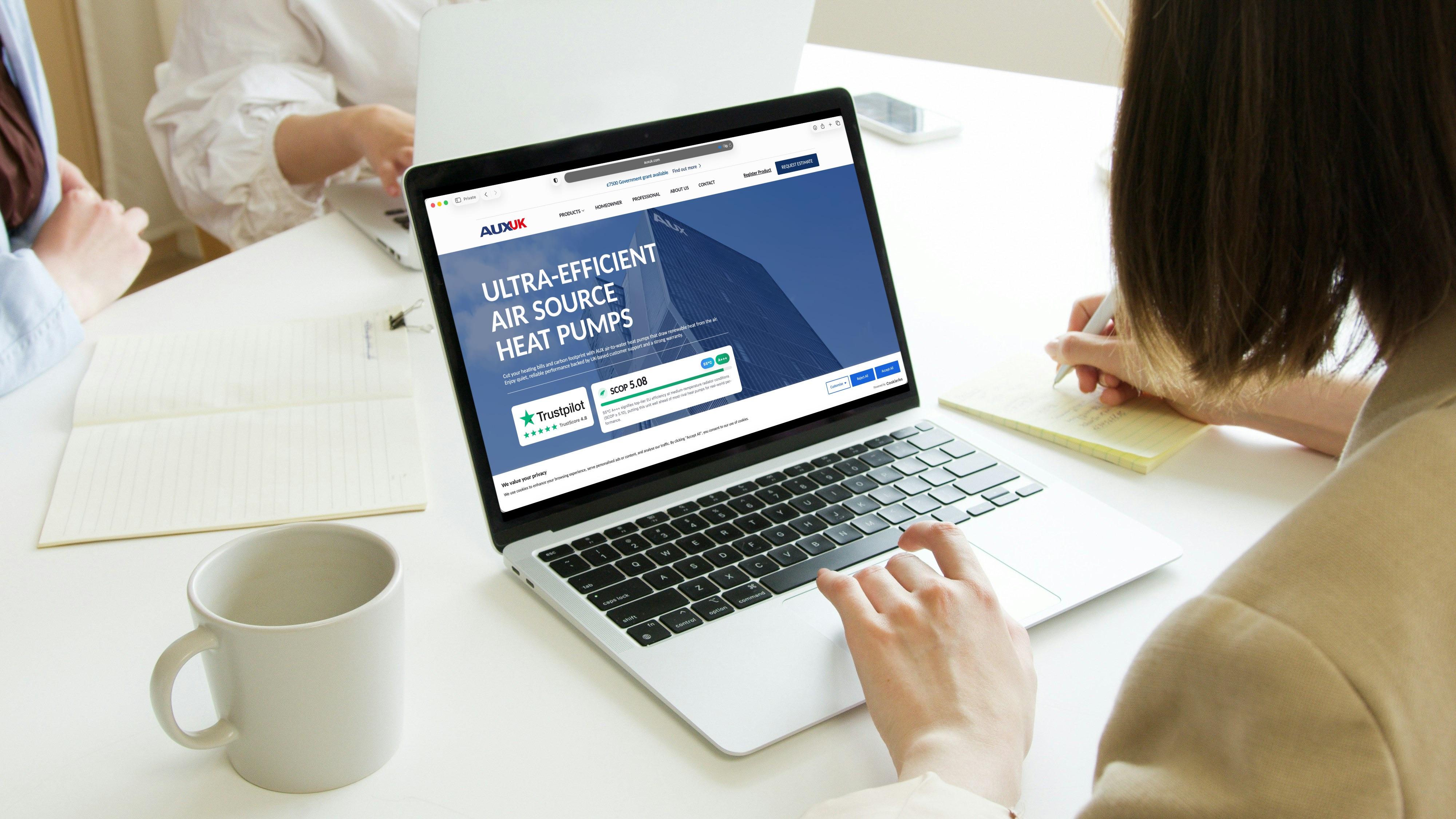 AUX UK air source heat pumps website designed by Digiwings on laptop