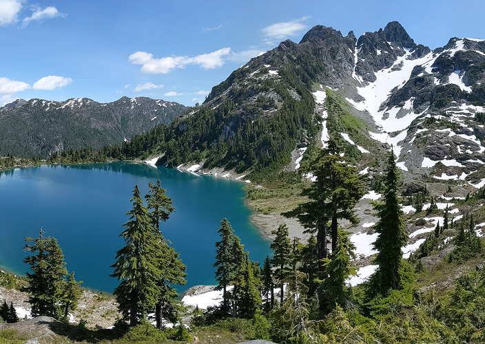 Alpine lake with mountains.