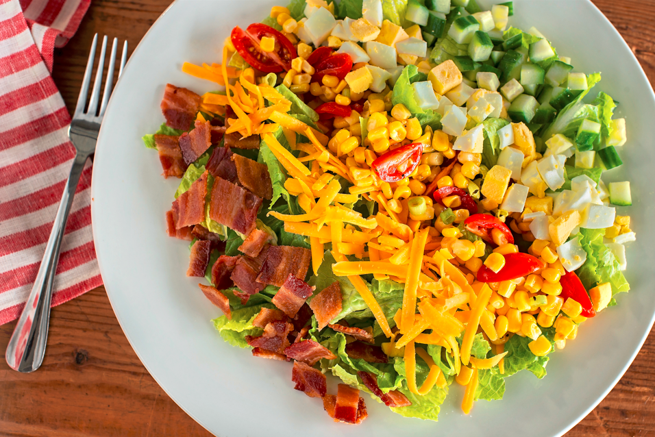 Our cobb salad has crisp romaine lettuce, crumbled bacon, chopped egg, tomato & corn relish, cheddar Shoney's - Gatlinburg Gatlinburg (865)325-8502