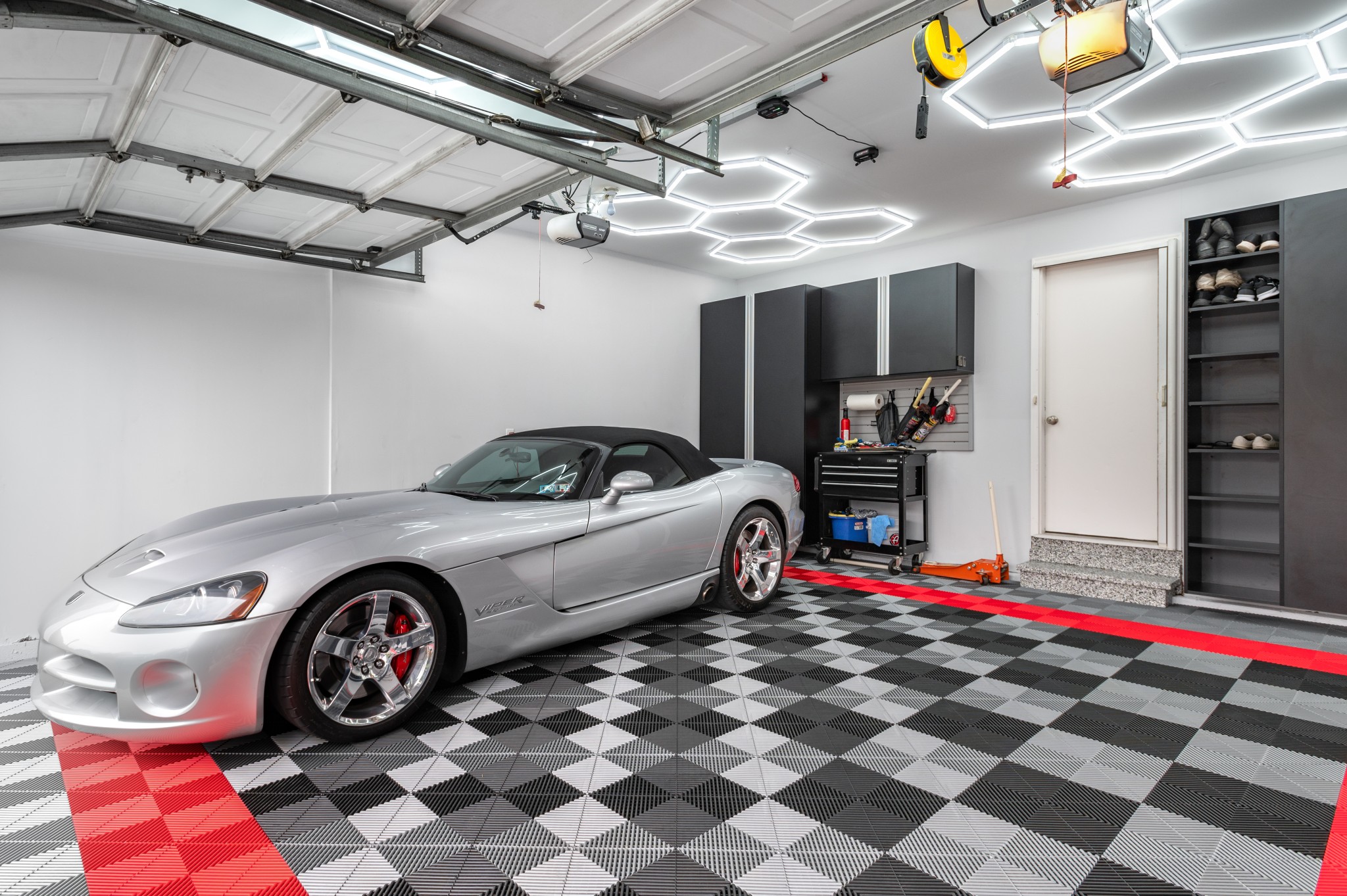 PremierTrax flooring is a great way to elevate your garage with a functional floor. We can help you incorporate any patter, color scheme, or design into a tile floor in your Lancaster, PA garage.