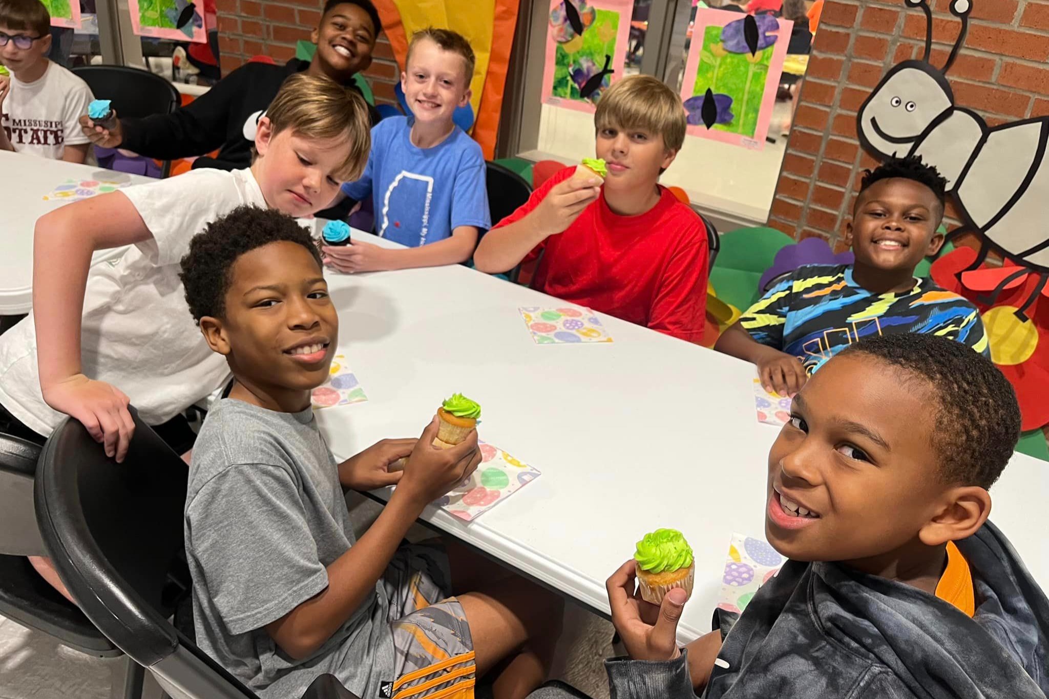 Celebrating the joys of springtime with our future leaders! These young minds are enjoying a delightful treat during our celebration at the local school. It&rsquo;s moments like these that remind us of the importance of community and togetherness.