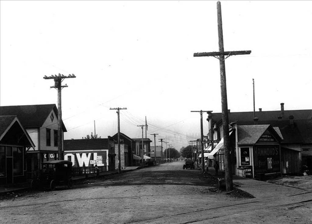 This is Front Street in 1913, facing North. You can see our agency on the left.
