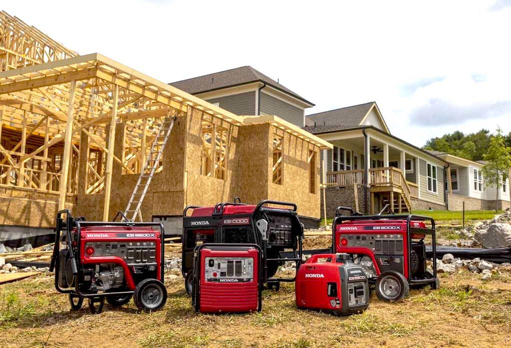 Different types of Honda generators displayed on a construction site