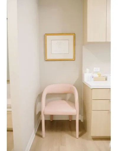 Private consultation room for Women’s Wellness Institute of Dallas and cosmetic gynecology services, designed for comfortable, confidential patient care and personalized treatment discussions.
