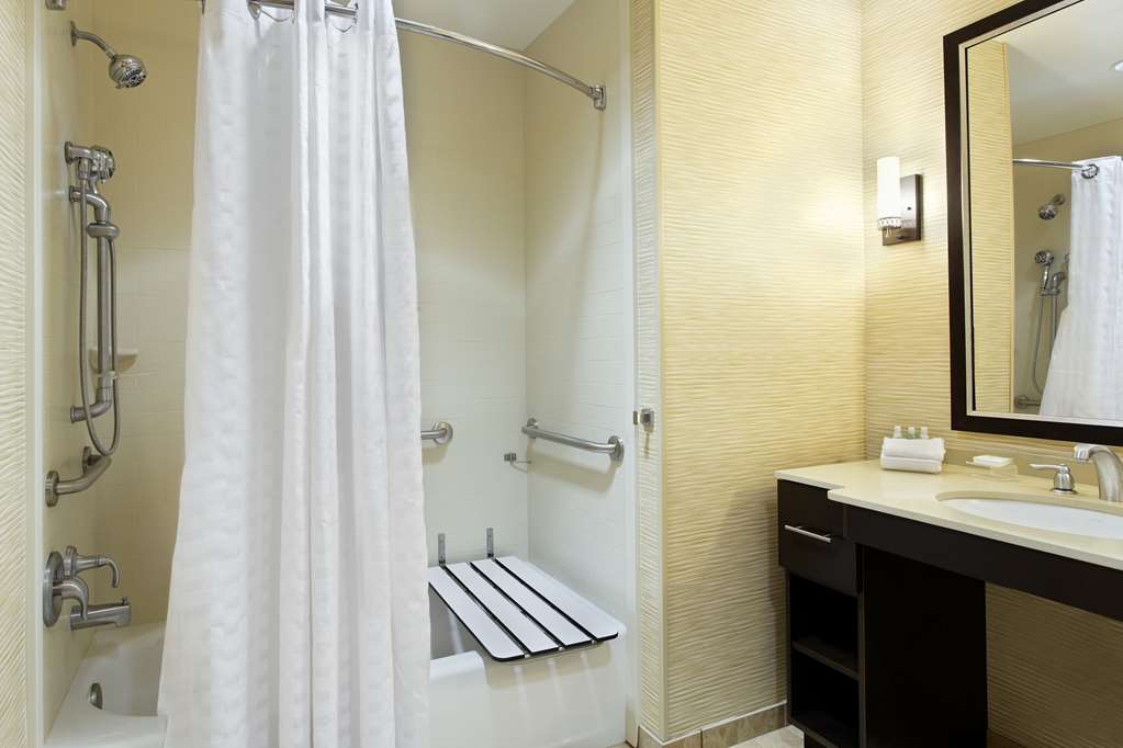 Guest room bath Homewood Suites by Hilton Orlando Airport Orlando (407)857-5791