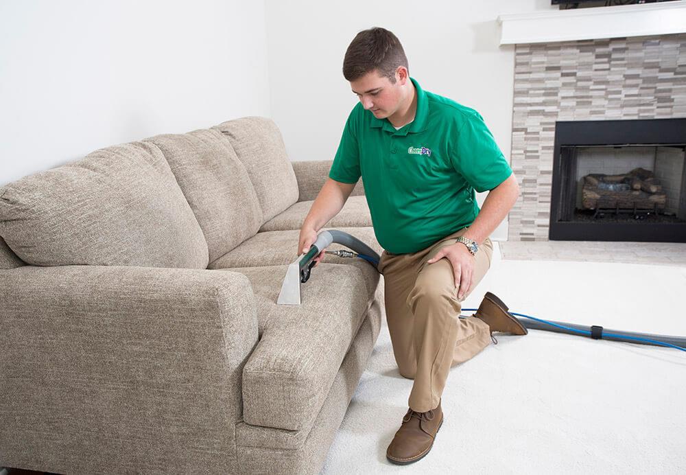 M.S. Chem-Dry tech performing upholstery cleaning in Omaha
