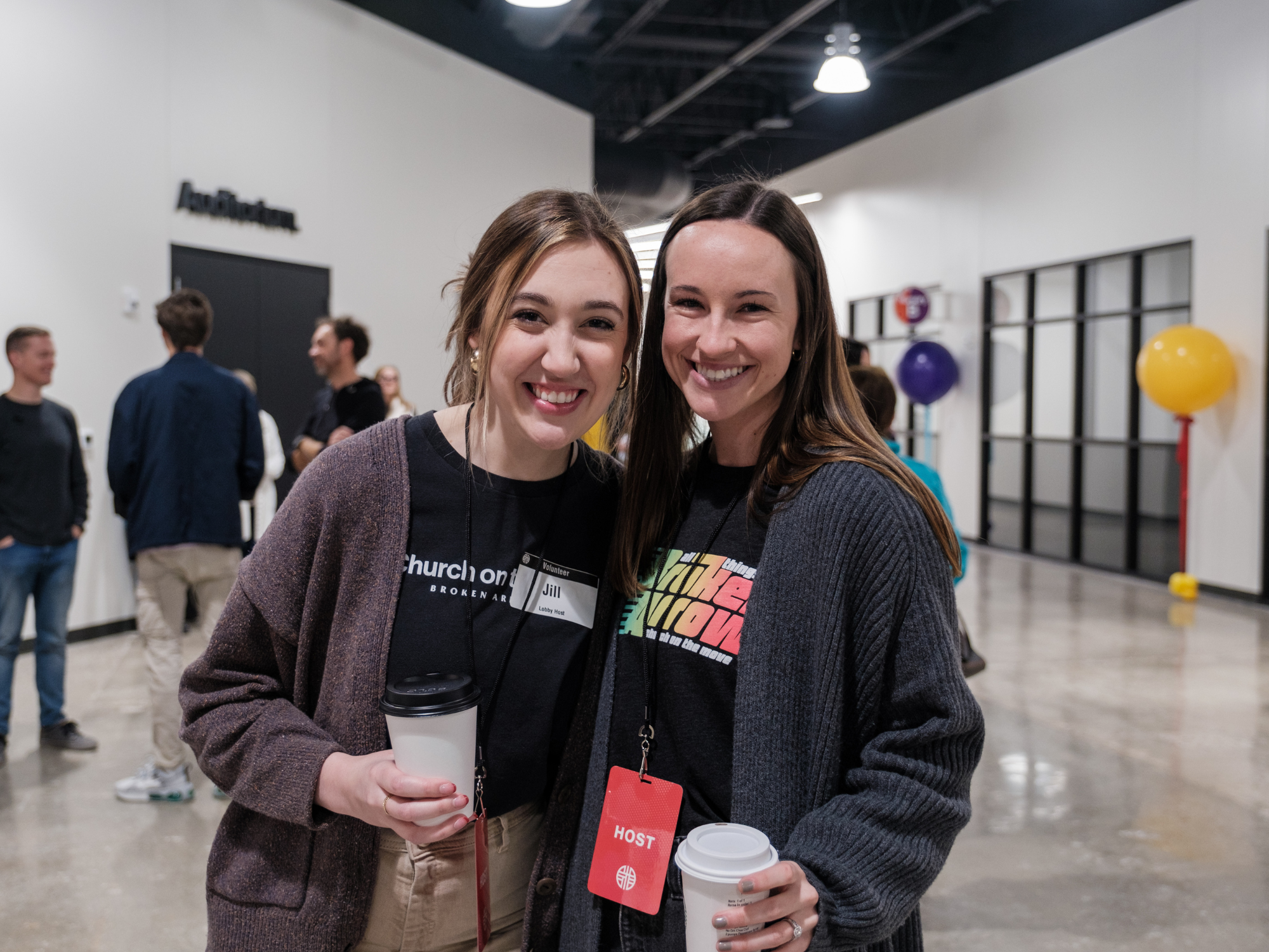 Ladies smiling in foyer at Church on the Move in Broken Arrow, Oklahoma