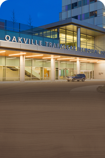 An evening shot of the Oakville Trafalgar Memorial Hospital.