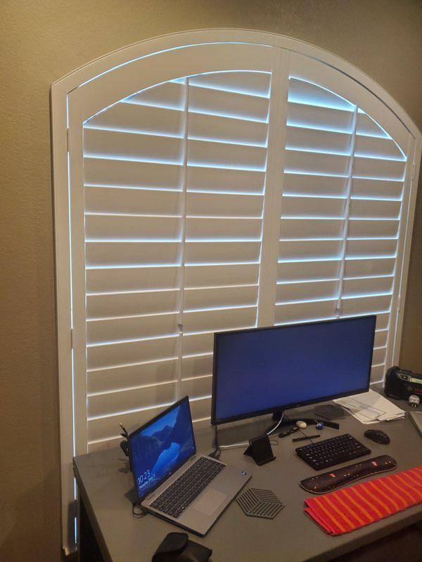 Just about everyone is working from home these days! In this Sugar Land home, the sunshine was a bit too much for the home office. Thanks to our Plantation Shutters, these homeowners don’t have to squint anymore! #BudgetBlindsKatySugarLand #SugarLandTX #PlantationShutters #ArchedShutters #FreeConsul