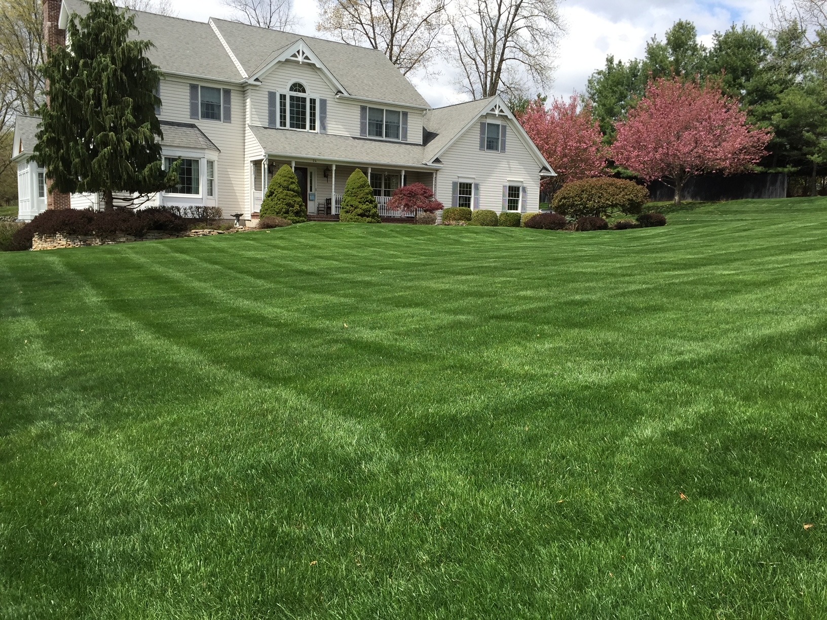 Home with freshly mowed lawn.