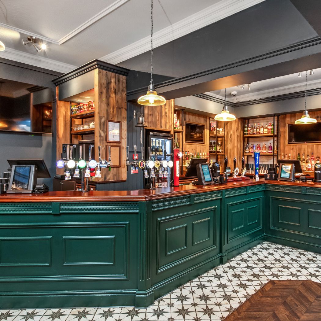 Well-stocked bar with a wide selection of draught beers, spirits and soft drinks, served from a stylish counter.