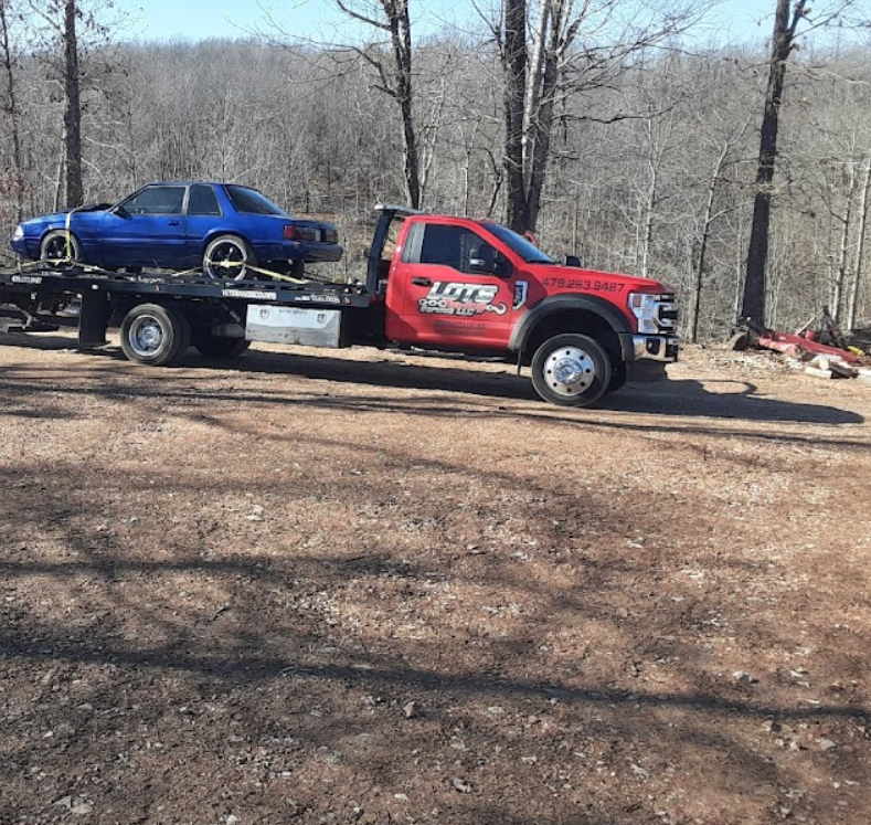 Images Lots Towing Service LLC
