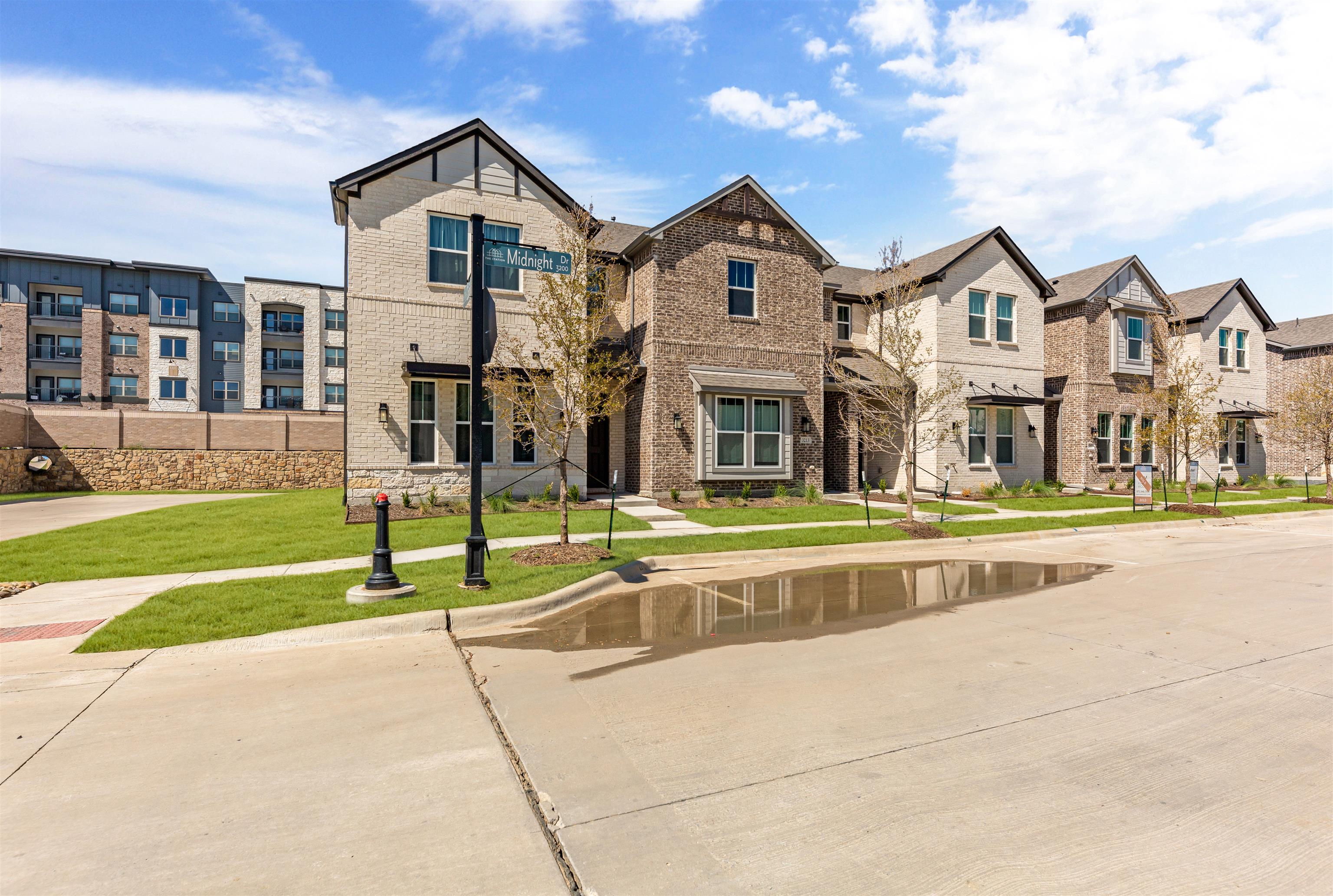 The  Station Townhomes by Ashton Woods in Sachse TX