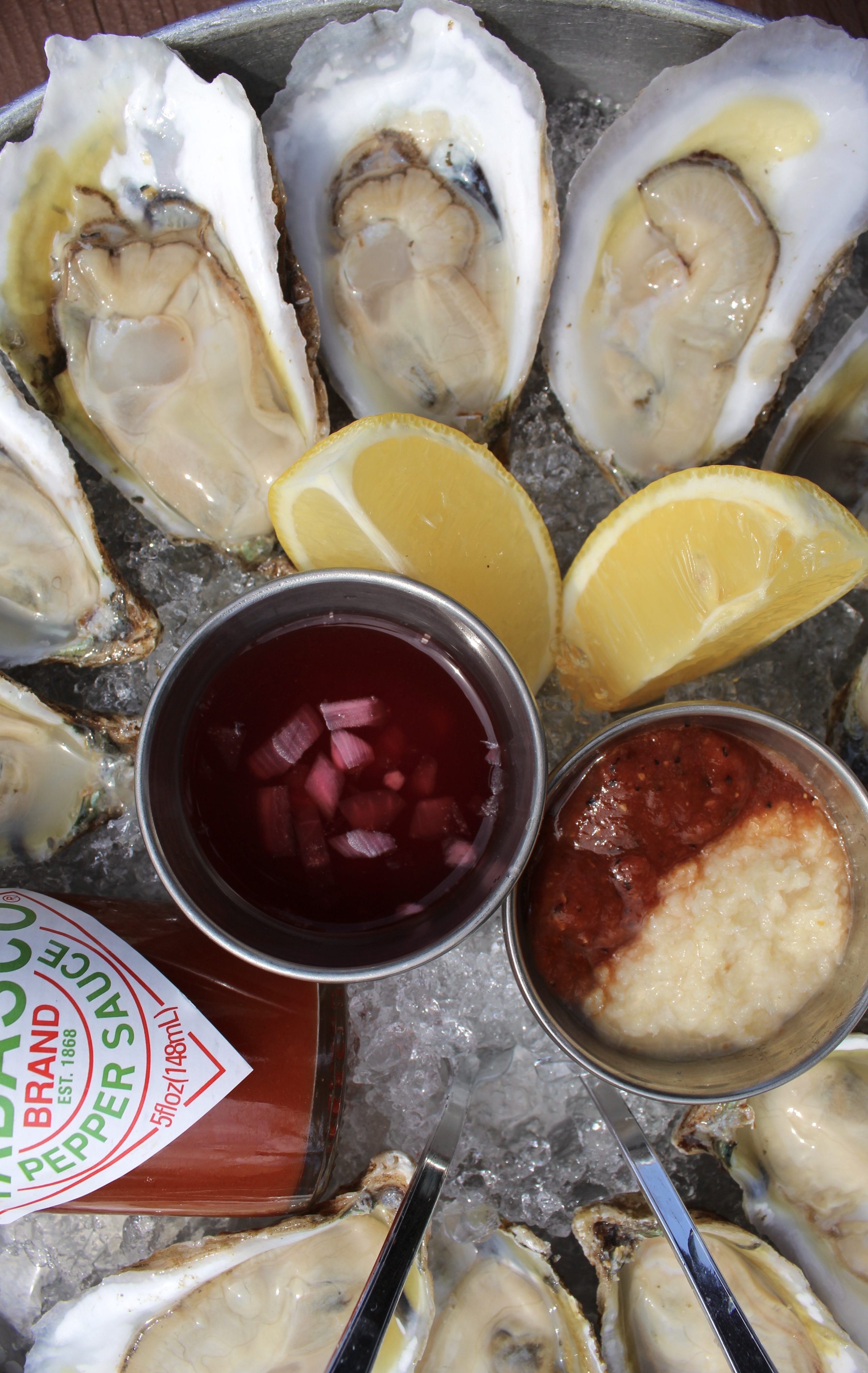 Oysters served with mignonette, horseradish, cocktail sauce, etc. 