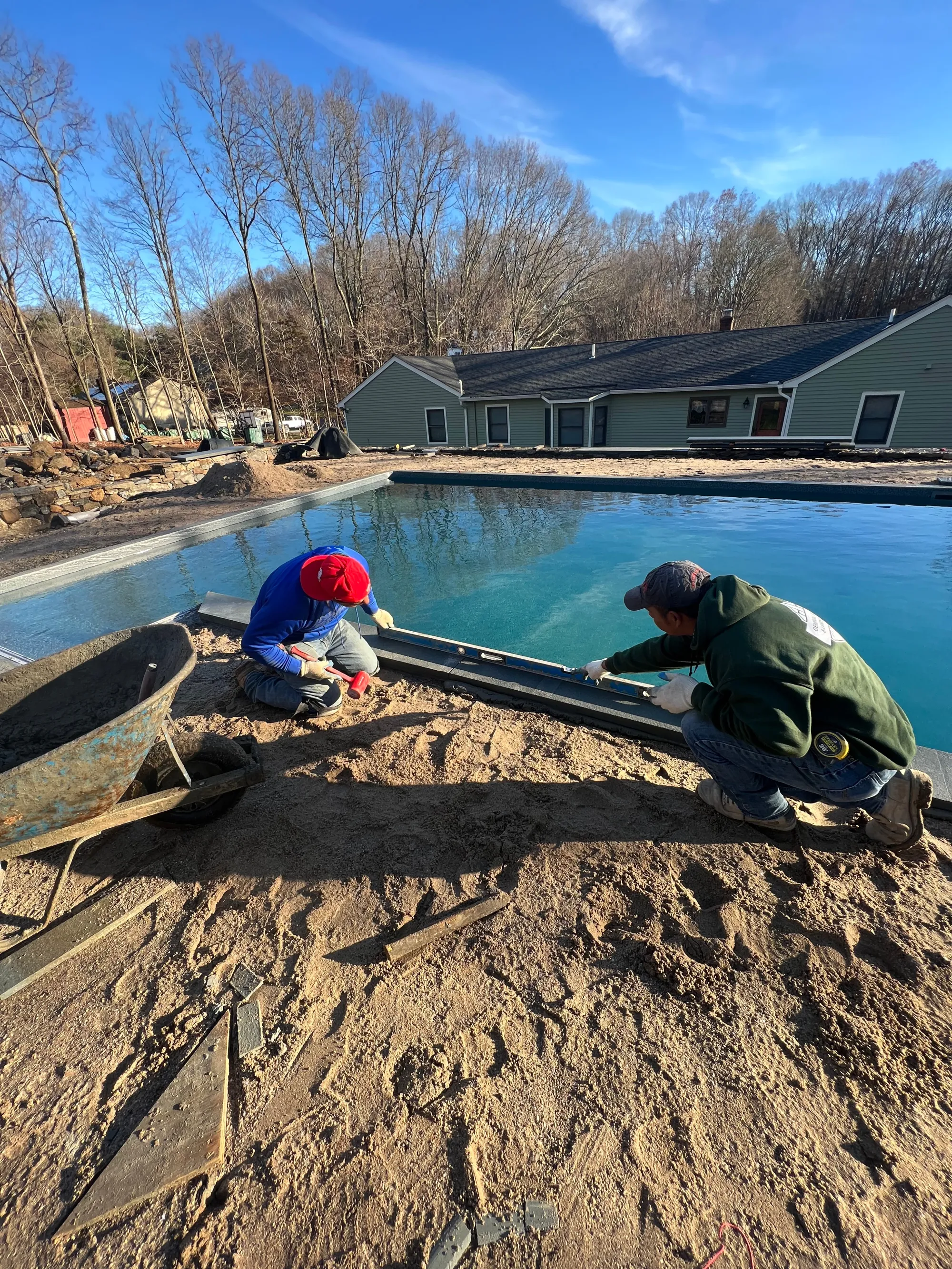 Finished paver pool deck in Bethany Connecticut - Paver Pool Deck, Bethany project by General Masonry LLC.