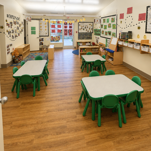 Bright and colorful preschool classroom at Childcare Network with age-appropriate learning materials