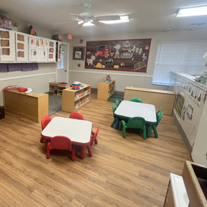Bright and colorful preschool classroom at Childcare Network with age-appropriate learning materials