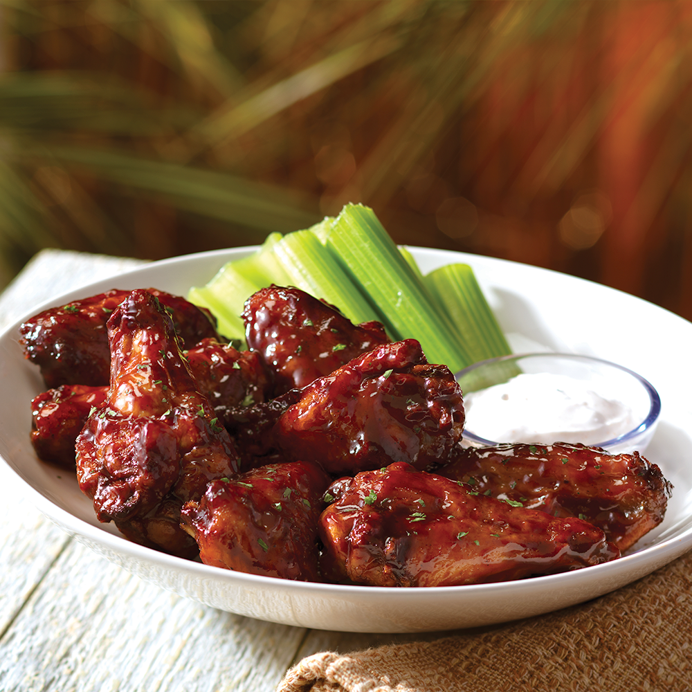 Classic Chicken Wings - Eight jumbo chicken wings tossed in your choice of sauce: spicy habanero BBQ sauce, classic buffalo or citrus-mustard.