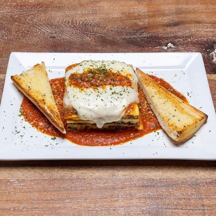 House made everyday | Ground Beef | Spinach | Ricotta | Topped w/melted mozzarella | Sprinkled w/par 