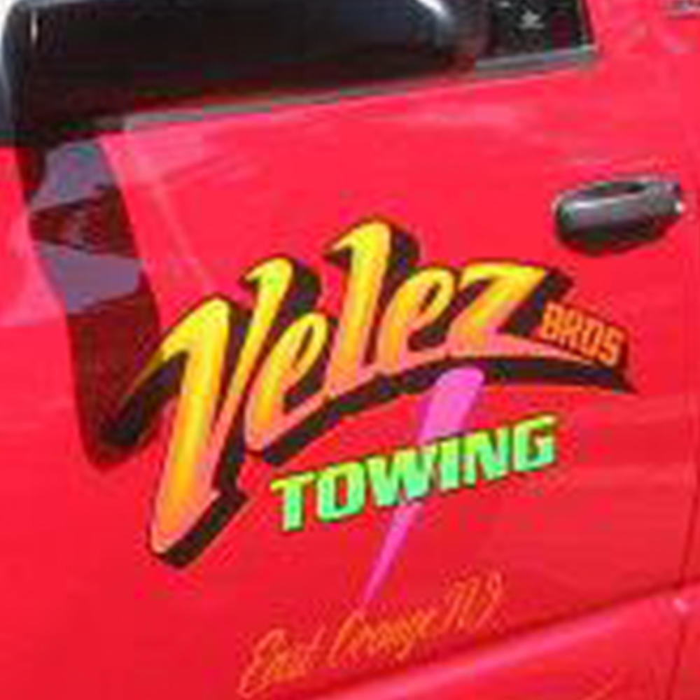 Velez Towing Logo