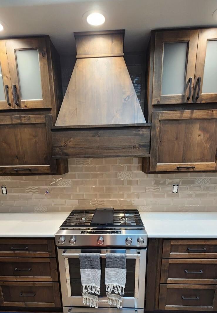 This beautiful vent hood was the perfect compliment to this kitchen remodel!