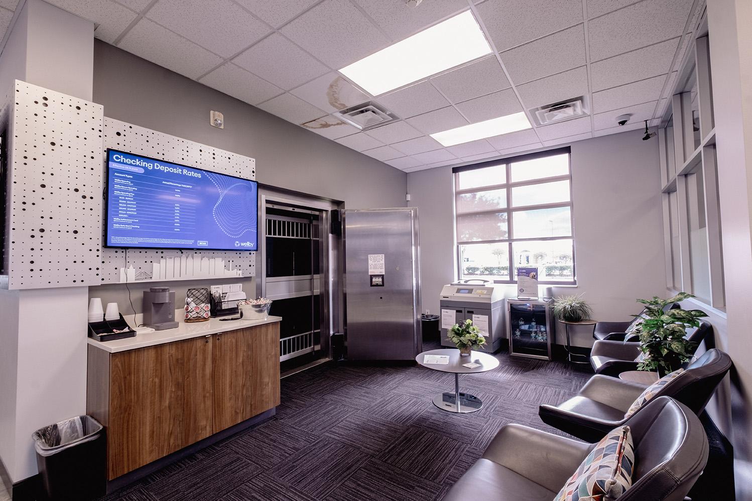 Interior of Wellby federal credit union with seating Wellby Financial Dickinson (281)488-7070