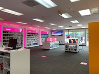 Interior photo of T-Mobile Store at E Colfax Ave & Glencoe St, Denver, CO