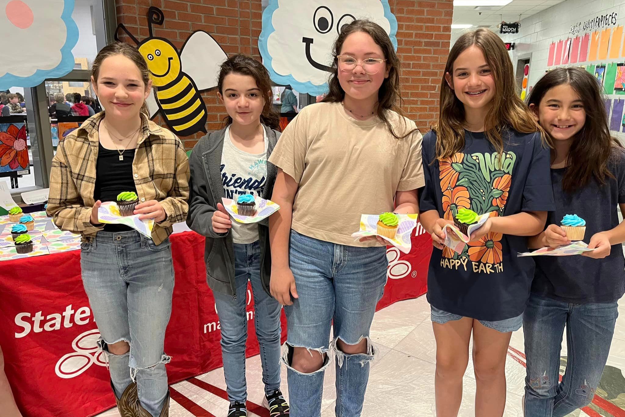 Celebrating the joys of springtime with our future leaders! These young minds are enjoying a delightful treat during our celebration at the local school. It&rsquo;s moments like these that remind us of the importance of community and togetherness.