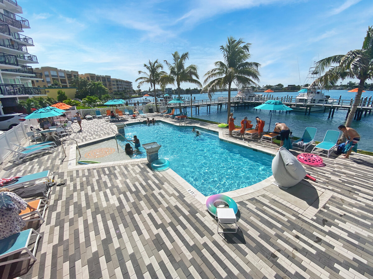 Resort-style waterfront pool overlooking the intracoastal waterway at FUSION Resort in Treasure Island, Florida.