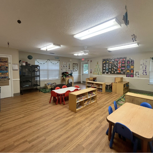 Bright and colorful preschool classroom at Childcare Network with age-appropriate learning materials