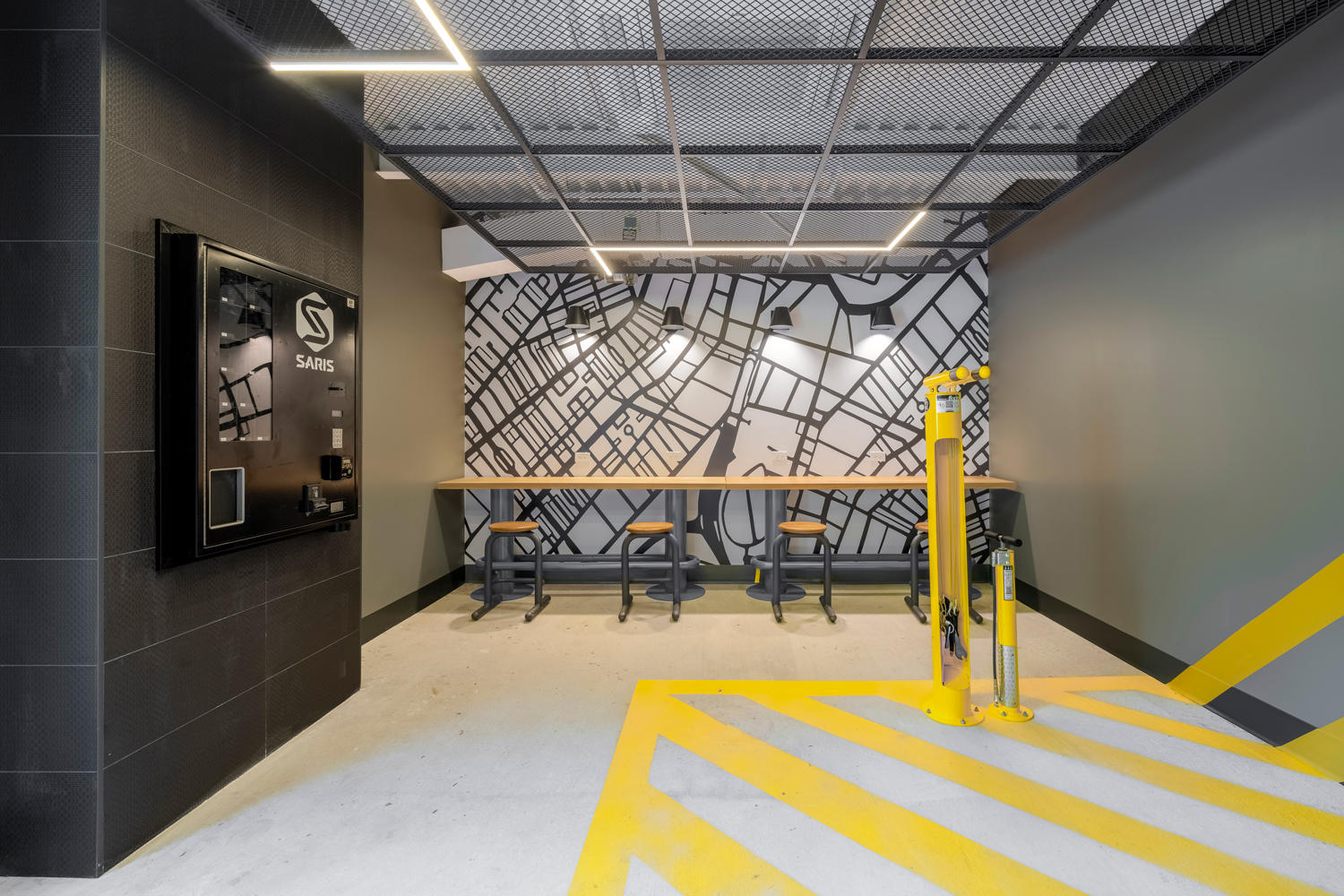 Controlled access bike storage & repair lab equipped with tools and seating