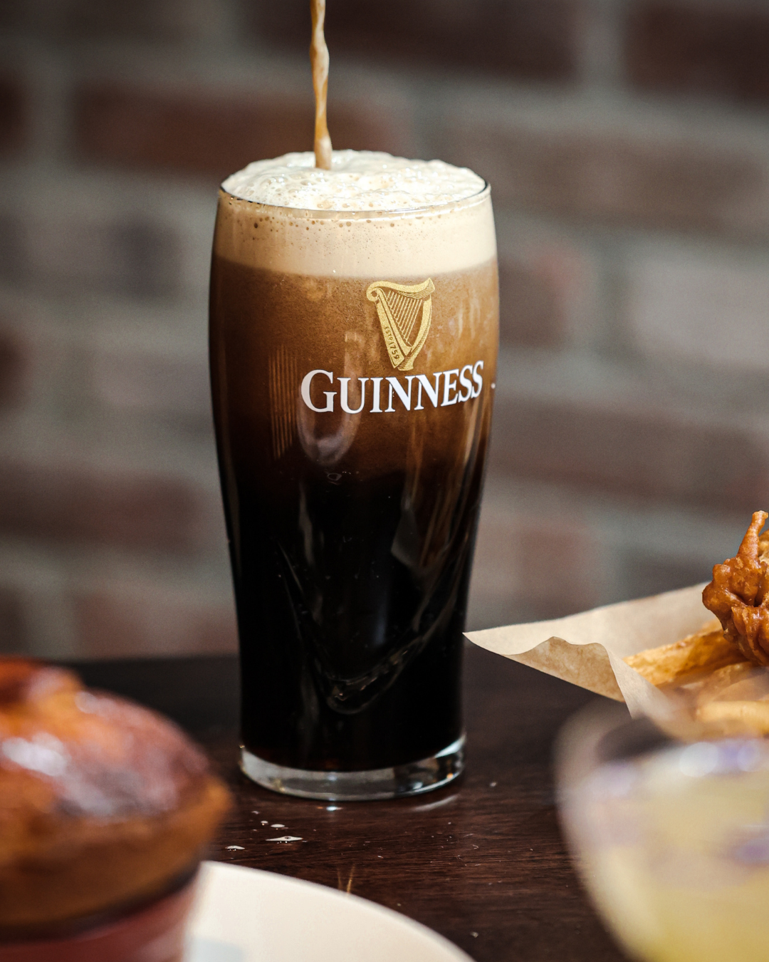 Guinness being poured at O'Toole's Way.