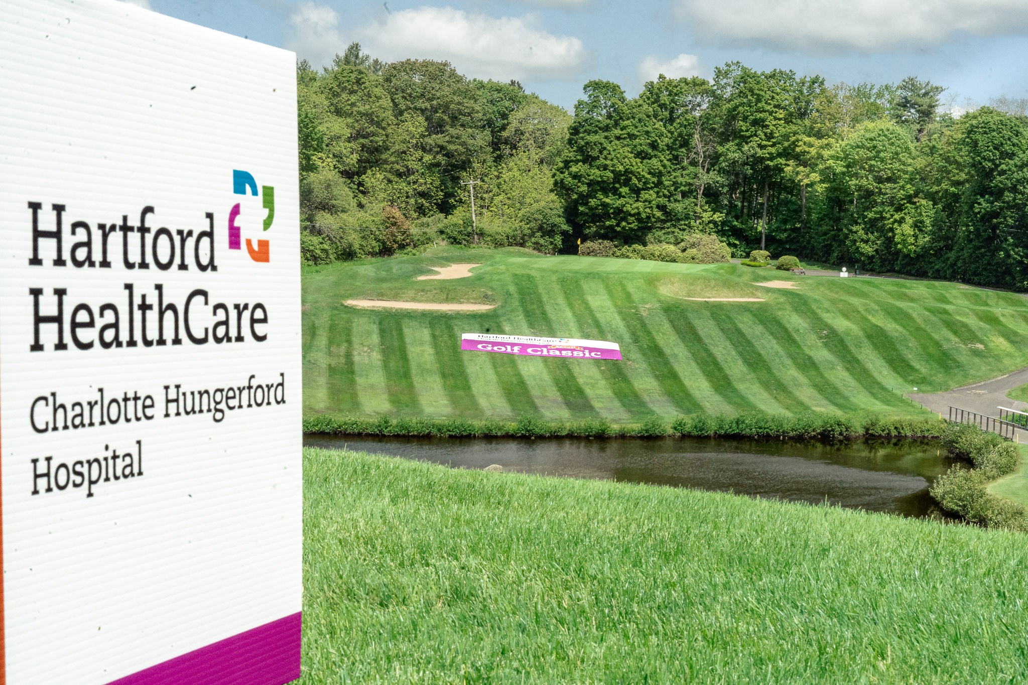 Large-format course branding signage produced by Sign Pro for the Charlotte Hungerford Hospital Golf Classic.