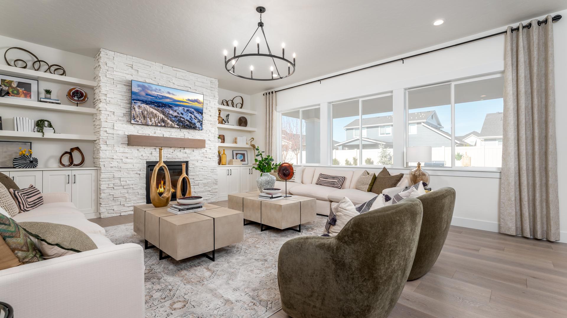 Great room with a traditional fireplace and floor-to-ceiling tile