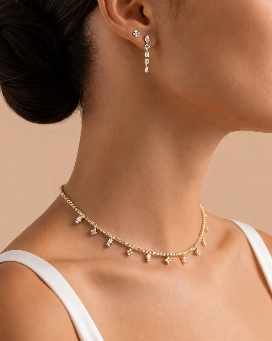 Elegant yellow gold diamond choker necklace with matching diamond drop earrings. A timeless fine jewelry set that adds brilliance, sophistication, and sparkle to every special occasion or everyday look.